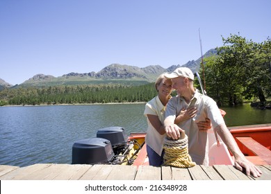 Couple Hugging On Fishing Boat