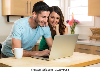 Couple Husband And Wife Writing Typing On New Modern Laptop Computer Device Blogging Sharing Chatting