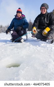 Couple Ice Fishing