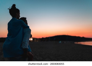 Couple inlove at beach with sunset - Shutterstock ID 2003083055