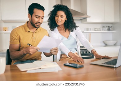 Couple, insurance paperwork and budget planning with laptop, bills and finance with taxes and mortgage. Financial documents, payment and loan with policy, audit and review with asset management - Powered by Shutterstock