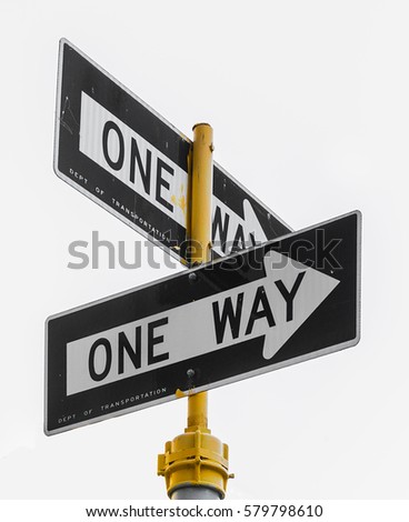 a couple of isolated one way sign