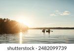 Couple, kayak and ocean with paddle in sunset for travel, hobby or outdoor holiday in water, lake or nature. Man and woman rowing boat in sunshine for canoeing, adventure or journey at sea on mockup