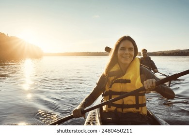 Couple, kayak and rowing on lake, happy and portrait with mock up space, holiday and fitness. Woman, man and people with boat, sunrise or outdoor in morning for vacation with water sports in Italy - Powered by Shutterstock