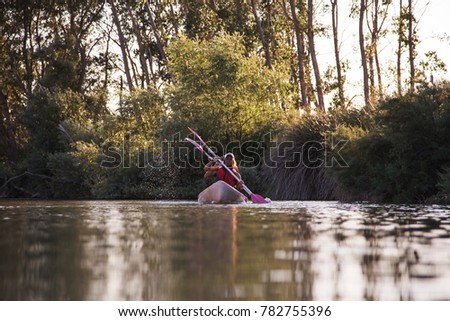 couple kayaking on the river