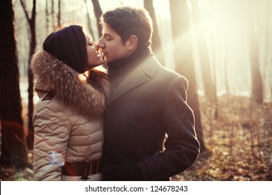 Couple Kissing On The Nature