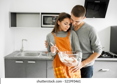 couple in kitchen couple