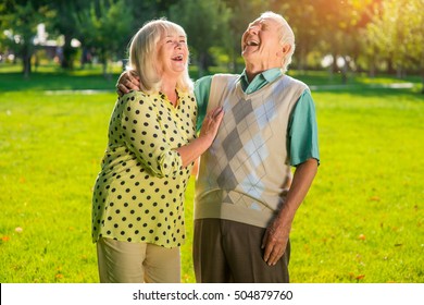 Couple is laughing. Elderly people outdoor. You're my happiness. Emotions and expressions.