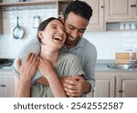 Couple, laughing and embrace in kitchen together for intimate moment, funny joke and connection in home. People, happy and hug in house with bonding, commitment and romance in relationship with love