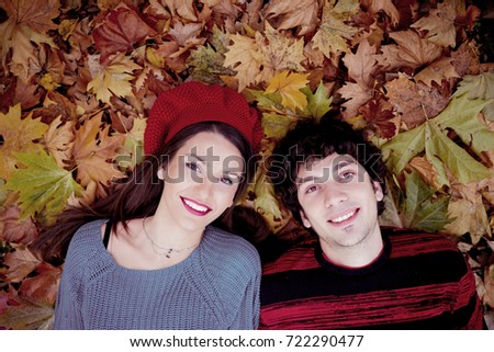 Young happy couple celebrating a birthday party