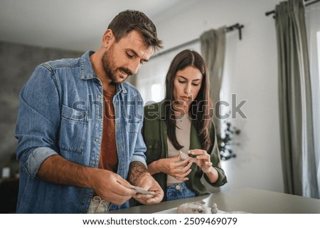 Couple learn and practice how to make a clay figurine, pottery