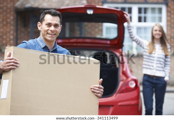 Couple Loading\
Purchase Into The Boot\
Car