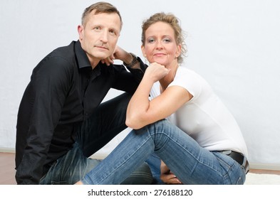 couple looking into camera