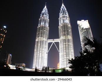 Couple Looking At KLCC Twin Towers, Located In Malaysia KL