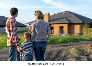 Couple Looking On  New House