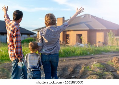 Couple Looking On New House