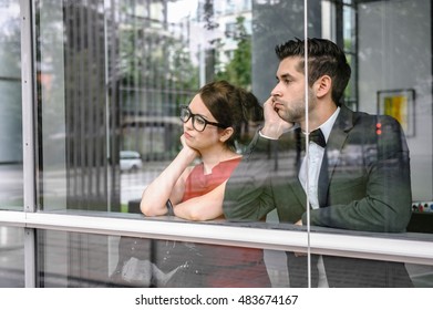 Couple looking out window
