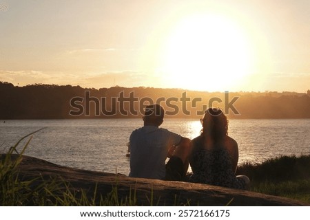 A couple looking at the sunset 