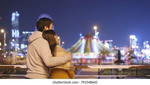 Couple Looking At Tourist Attraction View In Hong Kong 