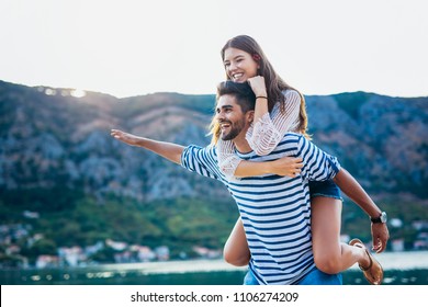 Couple In Love, Enjoying The Summer Time By The Sea.