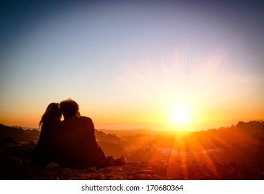 Couple In Love Enjoying Tender Moments During Sunset At Twin Peaks In San Francisco - Emotional Concept Of Relationship With Travel Boyfriend And Girlfriends Relaxing Together 