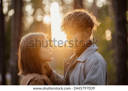 2 young women sitting opposite each other