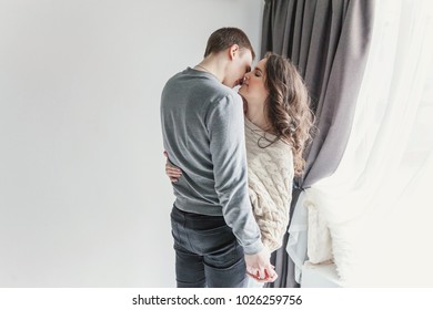 Couple in love having nice time together. Young happy woman hugging her handsome boyfriend. Cheerful casual people students having hopes, dreams, goals, bride and groom with family wants and - Shutterstock ID 1026259756
