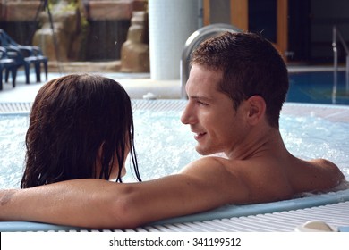 couple in love in jacuzzi enjoying a hydrotherapy session