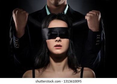 Couple Love Kiss, Sexy Blindfolded Woman and elegant Man in Suit