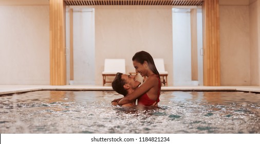 Couple In Love At Luxury Hotel Spa And Pool