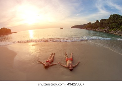 Couple in love on the beach. Sunset. Tropical. Love story. Lost beach. Paradise. Island.