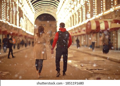 Couple In Love On A Christmas Walk In The City, Evening Snowfall December Holiday New Year