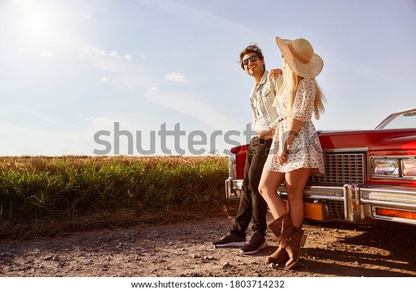 Couple in love on a road trip                           \
   