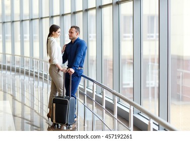 Couple in love on vacation. Couple standing in the airport.