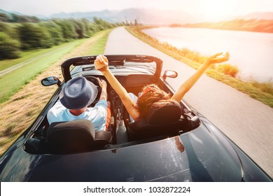 Couple In Love Ride In Cabriolet Car