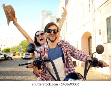 Couple In Love Riding A Motorbike , Handsome Guy And Young Sexy Woman Travel . Young Riders Enjoying Themselves On Trip. Adventure And Vacations Concept