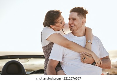 Couple, Love And Road Trip Travel Of Real People With A Hug And Smile In The Sun And Nature Outdoor. Happy Girlfriend And Boyfriend With Quality Time And Sunshine Happiness On A Relax Break Together