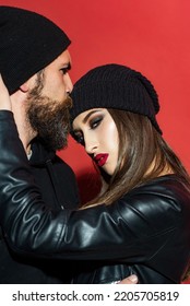 Couple In Love, Sensual Lovers Hugging And Embracing. Close Up Fashion Portrait Of Stylish Young Pretty Couple In Love Hugs On Red. Couple In Love On Date In Formal Fashion Look.