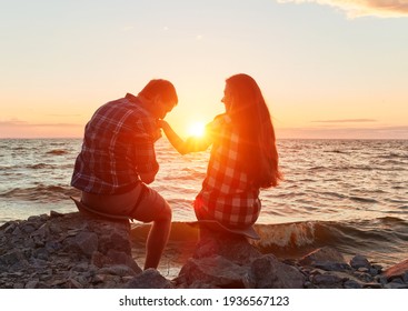Couple in love silhouette during sunset- touching noses