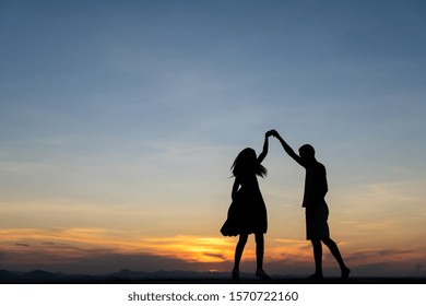 Couple in love silhouette during sunset,Harmony in relationship concept,romantic. - Powered by Shutterstock