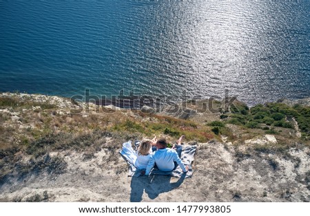 Similar – Image, Stock Photo Midnight sunbath by the fjord