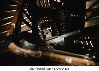 Couple In Love Stands On A Swirling Staircase Onto Which Light Falls From Above,couple Down The Stairs,top View Of A Couple Standing Near The Stairs,lovers Walk