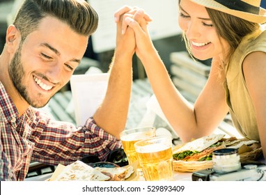 Couple In Love Taking Selfie At Beer Bar On Travel Excursion - Young Happy Tourists Enjoying Happiness Moment At Street Food Restaurant - Relationship Concept With Soft Focus And Desat Contrast Filter