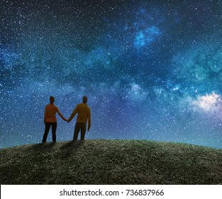 Couple In Love Watching The Stars In Night Sky