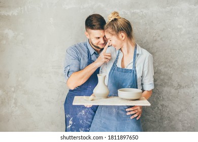 Couple in love working together in potter studio workshop.  - Powered by Shutterstock