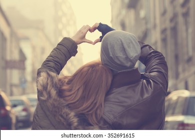 Couple in love.Focus on hands. - Shutterstock ID 352691615