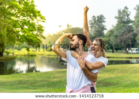Couple Lover happy funny and holding together  in Public park
