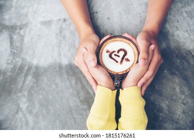 Couple lover having date and drinking a cup of coffee together. happy relation on cafe. coffee lover concept. Close up woman hands holding cup of coffee. Drinking coffee make people freshness