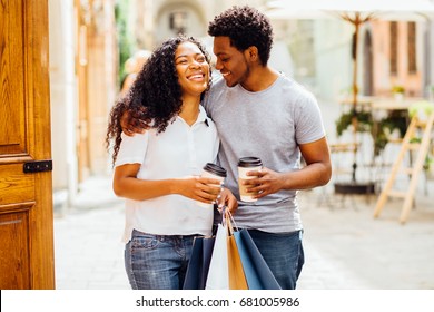 Couple of lovers kissing, hugging and having fun in city streets - tourism, travel, people, leisure and teenage concept.