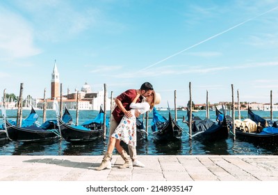 Couple of lovers visiting Venice, Italy - Boyfriend and girlfriend having romantic italian weekend  - Shutterstock ID 2148935147